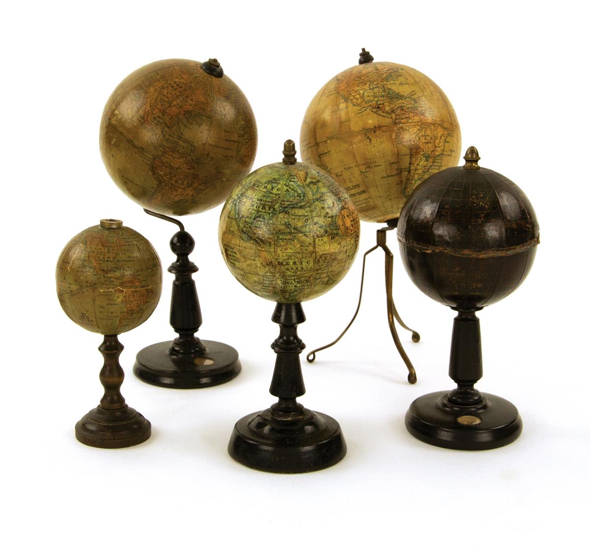 (GLOBES.) Group of 5 miniature globes.